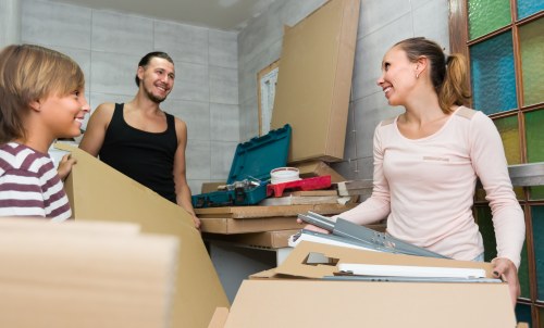 Office removals planning in Kingston Vale with moving boxes and desks