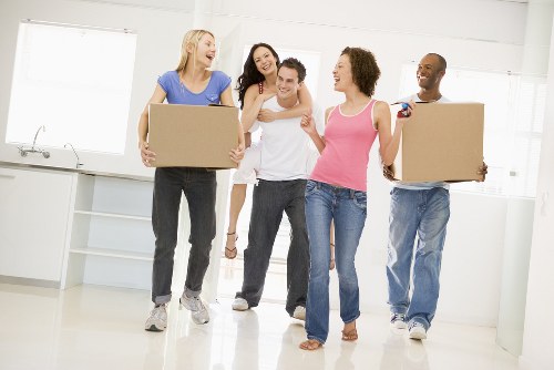 Office relocation planning in Kingston Vale with moving team and boxes