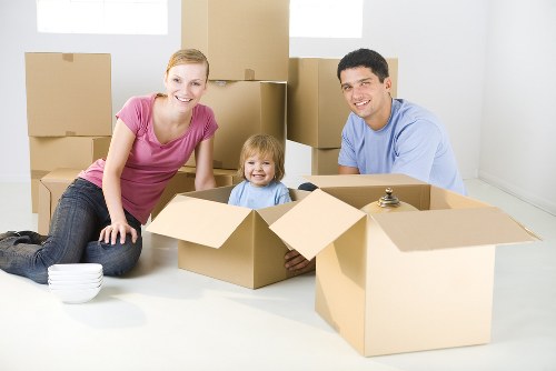 Moving van and packed boxes ready for a home move in Kingston Vale
