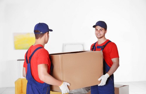 Residential furniture being carried carefully during a home relocation
