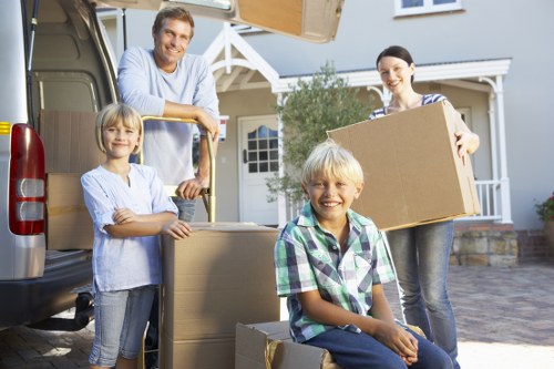 Removal team loading furniture and boxes for a local house move