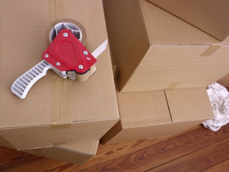 Household items being loaded safely for transport in Kingston Vale