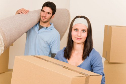 Professional moving team assisting a small move in Kingston Vale