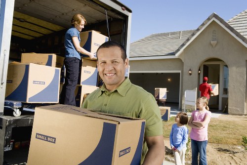 Driver helping with a small move near Kingston Vale homes