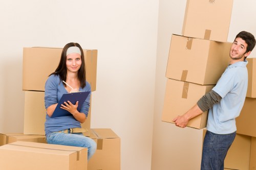 Careful loading of furniture into a local removals van